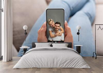 Friends Talking Via Video Call On Smartphone At Home, Cropped Wall mural