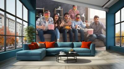 German sport fans with colored faces at home Wall mural