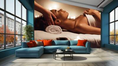 Girl having massage and enjoying aroma therapy in spa Wall mural