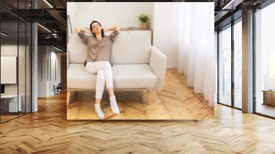 Girl having rest at her home on the weekend Wall mural