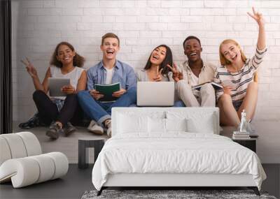 Group of happy students studying for university exams Wall mural