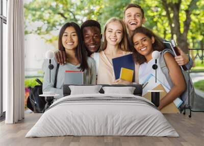 Group of international students having fun after studying Wall mural