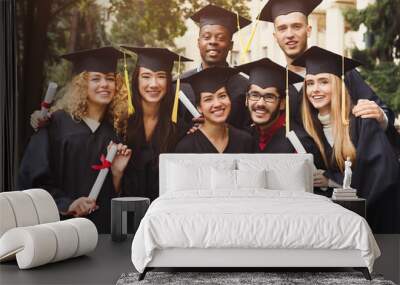 Group of students taking photo on graduation day Wall mural