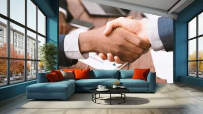 Handshake of african american and caucasian business partners Wall mural