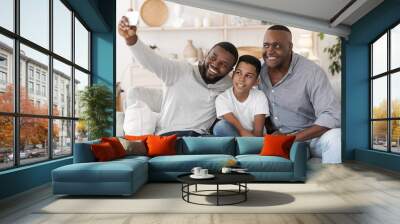 Happy african father, son and grandfather taking selfie on smartphone at home Wall mural