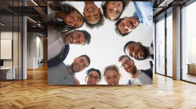 Happy diverse business people standing in circle Wall mural