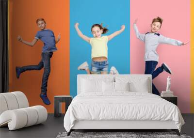 Happy Diverse Kids Jumping Posing Over Different Colorful Backgrounds, Collage Wall mural