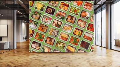 Healthy Eating. Set Of Containers With Tasty Everyday Meals Over Green Background Wall mural