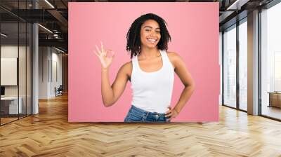 I'm Fine. Smiling curly black woman showing ok sign and looking at the camera over white background, copyspace Wall mural