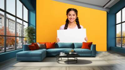 Indian woman holding blank white advertising board Wall mural