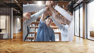 Inspired manager giving high five to his international young team Wall mural