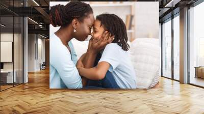 Loving african mom spending time with child Wall mural