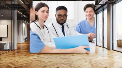 Medical Staff Having Discussion In Meeting Room Wall mural