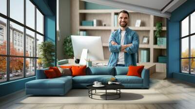 Modern Entrepreneur. Portrait Of Handsome Young Businessman Standing Near Desk At Office Wall mural