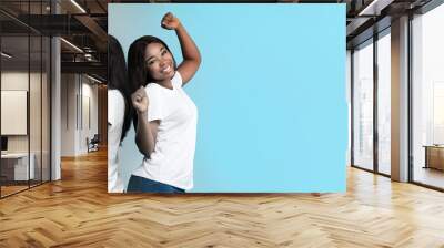 Mood Swings Concept. Young African American Female Expressing Contrasting Emotions Wall mural