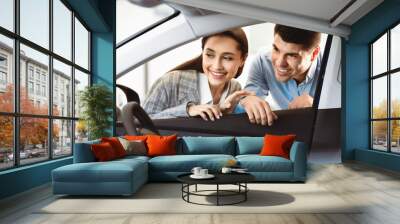 New Transport. Happy Husband And Wife Looking At New Auto Together, View From The Inside Of The Car. Copy Space Wall mural