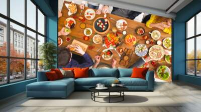 People eat healthy meals at served table dinner party Wall mural