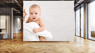 Portrait of angelic baby and his mother Wall mural