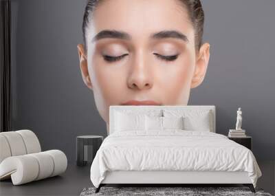 Portrait of beautiful woman with clean skin and closed eyes Wall mural