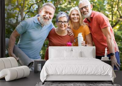 Portrait Of Happy Senior People Posing Together Outdoors After Fitness Training Wall mural