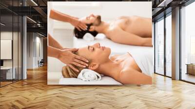 Relaxed Spouses Getting Head Massage Together Relaxing Lying At Spa Wall mural