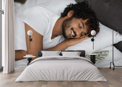 Rich indian man sleeping with lots of cash Wall mural