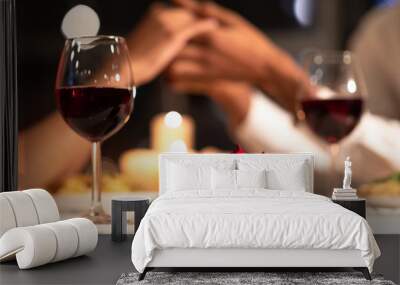 Rose Lying On Table, Loving Couple Holding Hands In Restaurant Wall mural