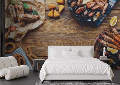 Seafood platter top view, flat lay on wooden table background Wall mural