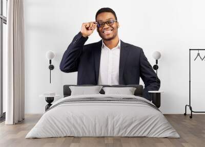 Smiling handsome businessman isolated over white background Wall mural