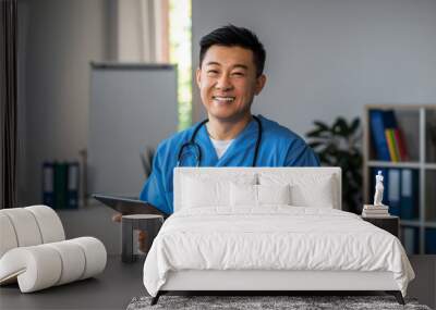 Smiling middle aged japanese male doctor with tablet and wait patient in clinic office interior. Treatment with professional therapist, medical health care and good service during covid-19 pandemic Wall mural