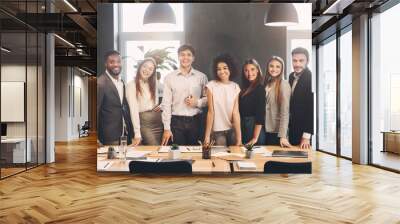 Successful managers posing and looking at camera in office Wall mural