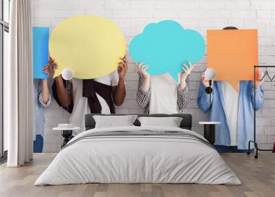 Teenagers holding speech bubbles with copy space Wall mural