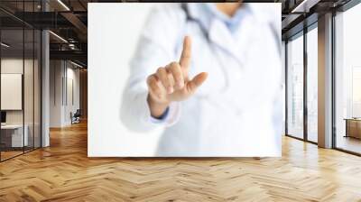 Unrecognizable woman doctor touching transparent screen, cropped Wall mural