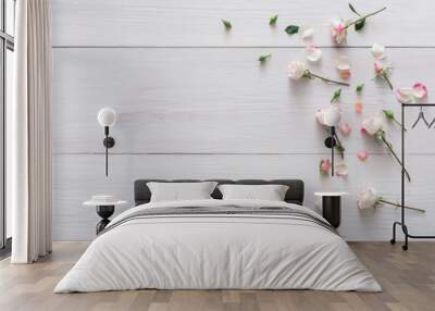 Valentine day background, petals and flowers on white wood Wall mural