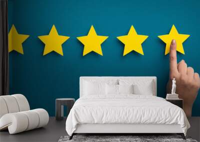 Woman hand showing on five star excellent rating Wall mural