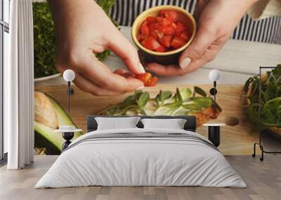 Woman making tasty bruschettas for healthy snack, closeup Wall mural