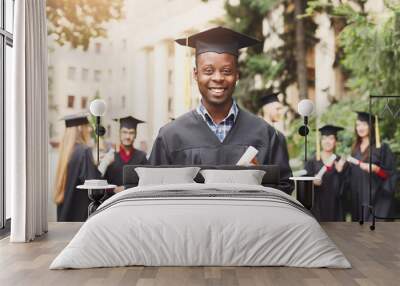 Young black man on his graduation day. Wall mural