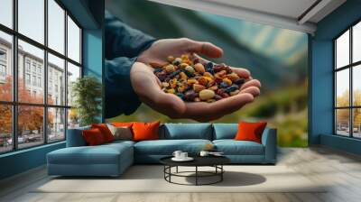 Closeup of Hands Holding Trail Mix with Almonds, Raisins and Nuts. Wall mural