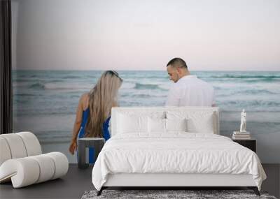 beautiful family on the beach Wall mural