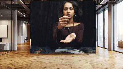 Portrait of fortune-teller in a dark room Wall mural