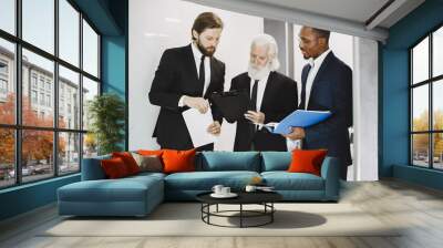 Three busines partners men in the office Wall mural