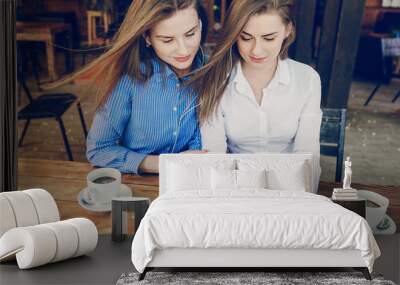 two girls in a cafe Wall mural