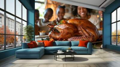 Happy African American family having Thanksgiving dinner at dining table Wall mural