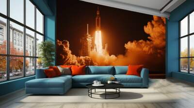 night image of a space rocket launch. The rocket is in the midst of a powerful ascent, with bright flames and smoke trailing behind it. Wall mural