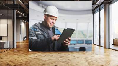 Portrait of a power plant engineer controlling the proper operation of equipment Wall mural