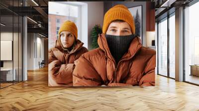 Shutdown of home heating. Man and woman freeze at home. European gas shutdown concept Wall mural