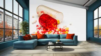 red-white tablet capsule with red-white balls on white background Wall mural