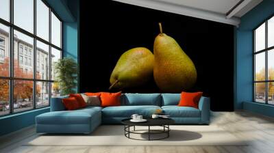 Two ripe pears on black background Wall mural