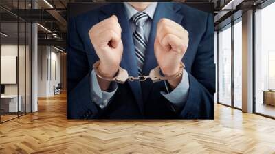 Businessman arrested, man in suit with handcuffs Wall mural