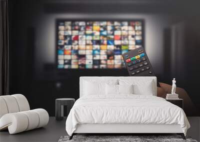 Multimedia video concept on TV set in dark room Wall mural